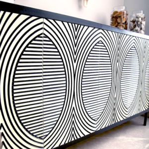 Hand-crafted custom cabinet with geometric patterns, a hallmark of edge.ids bespoke furniture design for luxury residential spaces.