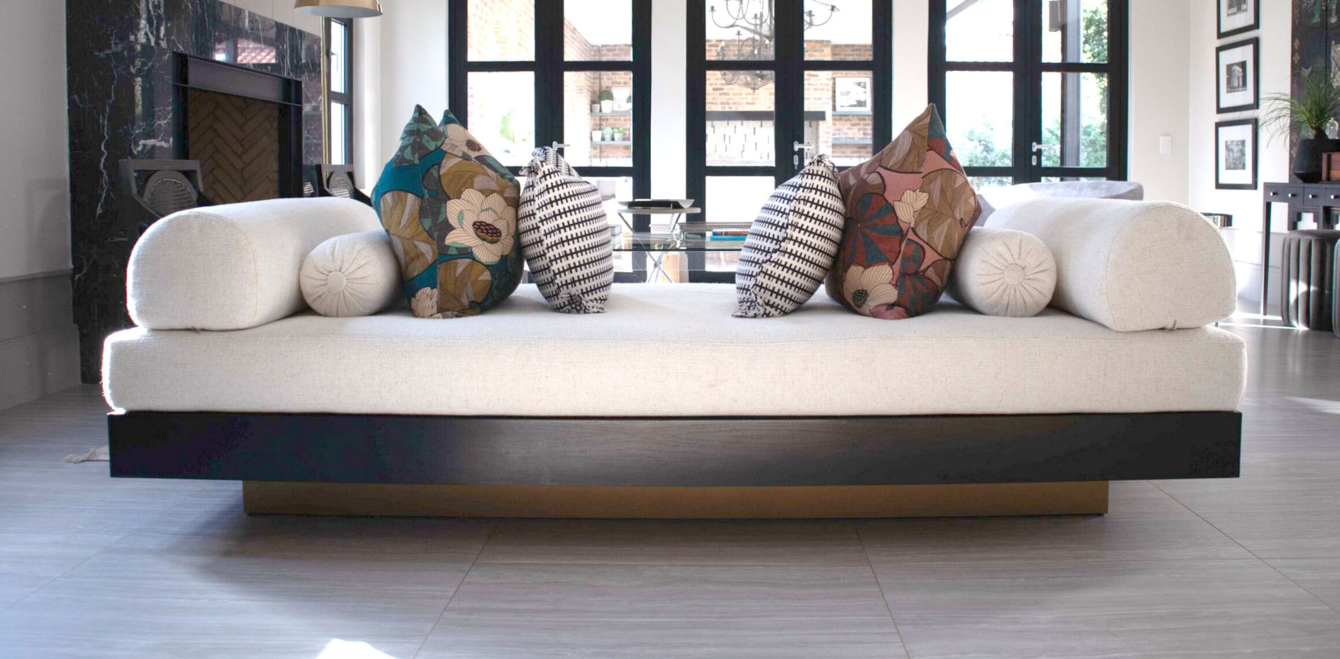 Bespoke residential interior design by edge.ids featuring a custom day lounger and designer hardware in a modern Johannesburg home.